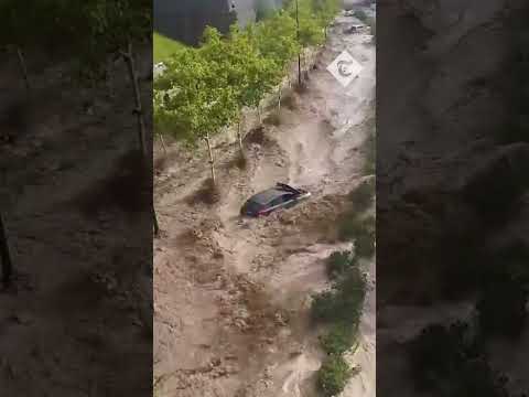 Dramatic moment severe flooding sweeps cars away in Spain